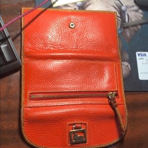 Used wallet, lots of wear, very durable.